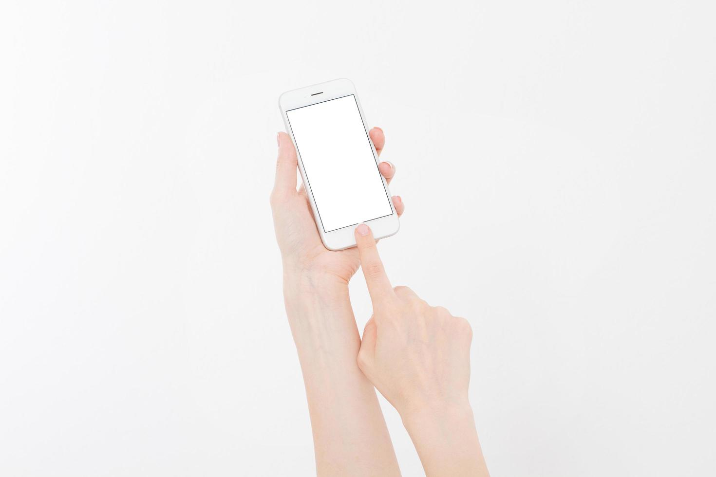 Hand holding white phone isolated on white clipping path inside. Top view.Mock up.Copy space.Template.Blank. photo