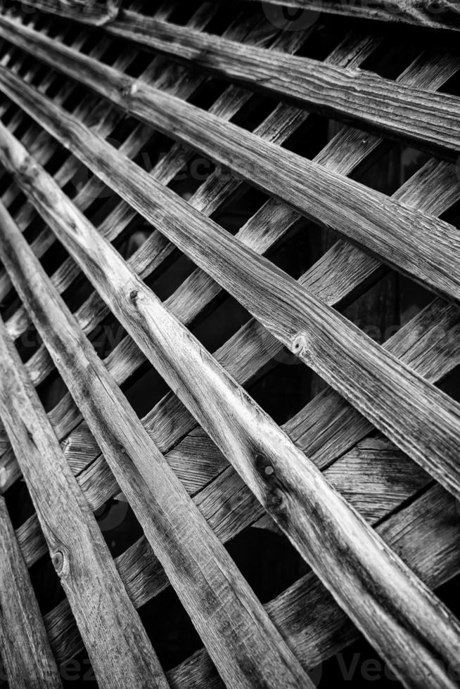 Damaged wooden fence photo