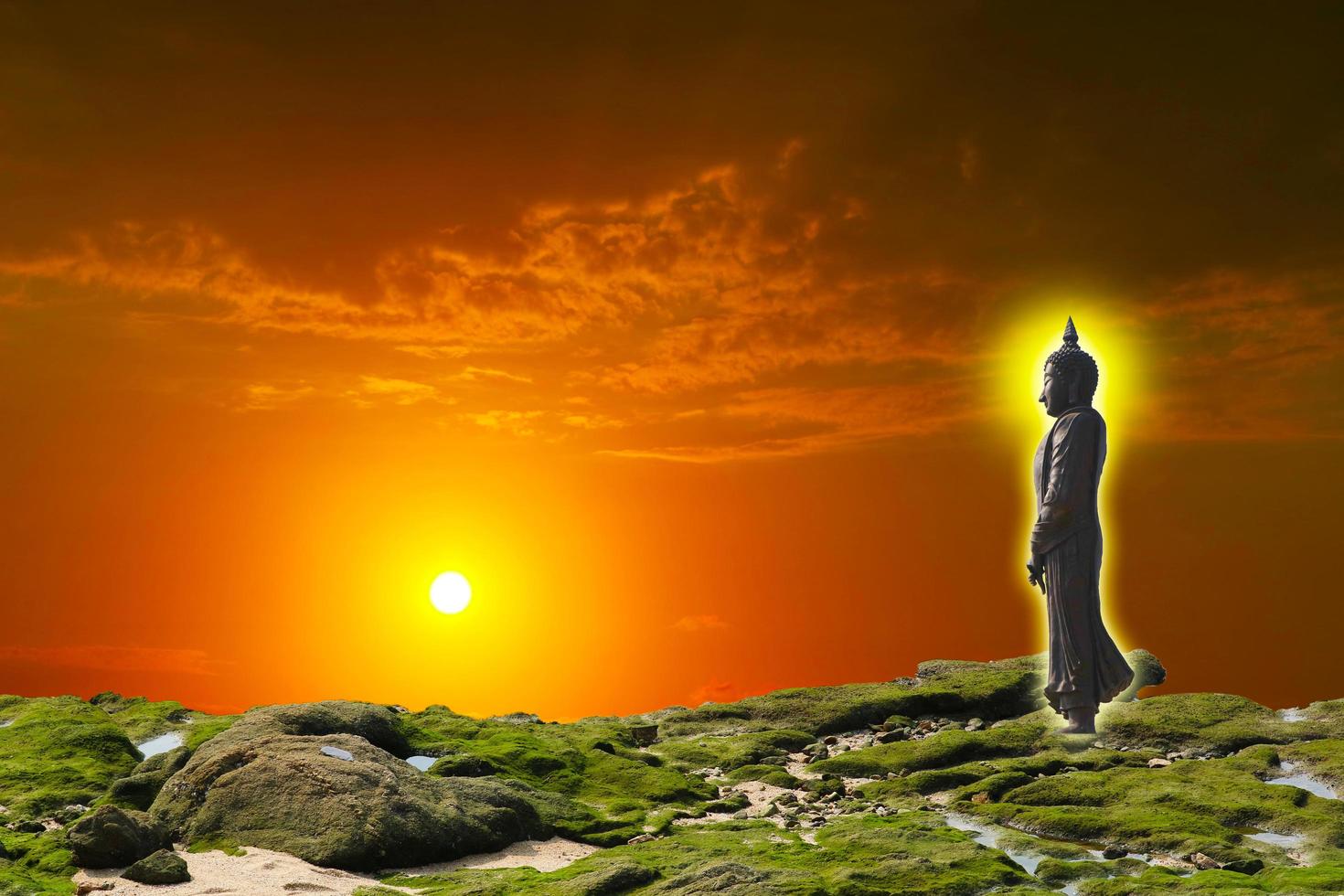 Buddha looking seven day style on the sunset sky photo