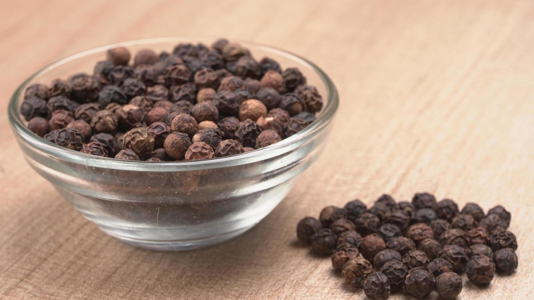 Group of Organic Black pepper isolated on white background. Selective focus and Top view ,Flat Lay photo