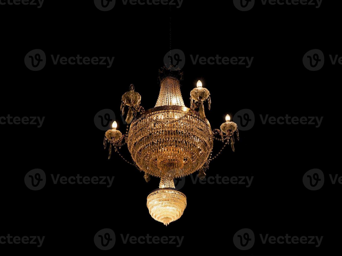 vintage chandelier, warm yellow light photo