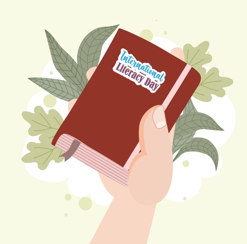 hand with international literacy day vector