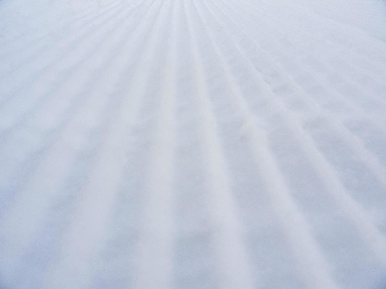Waves of snow texture macro photography, Norway. photo