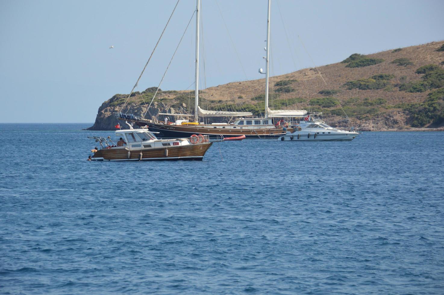 BODRUM, TURKISH - JULY 02, 2020 Yachts parked in the marina photo