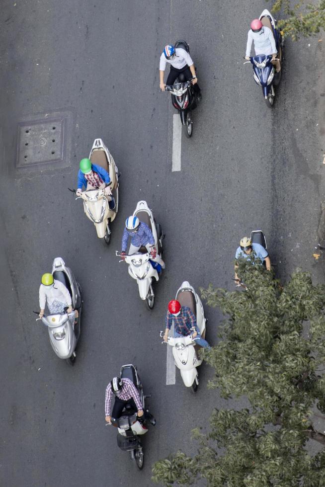 HO CHI MINH, VIETNAM, FEBRUARY 22, 2017 - Unidentified people on the street of Ho Chi Minh, Vietnam. Ho Chi Minh is the largest city in Vietnam. photo