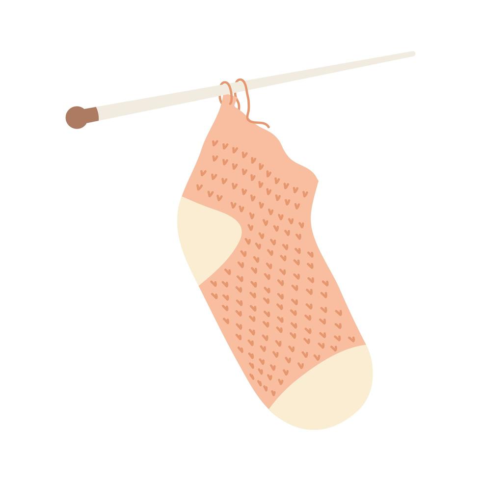 Knitted sock with needles vector