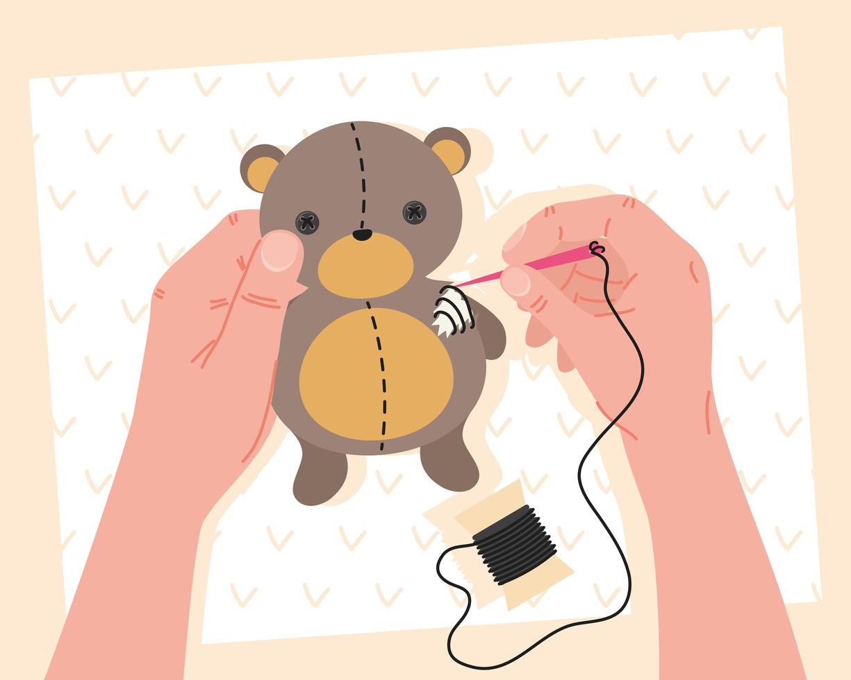 hands embroidering bear project vector