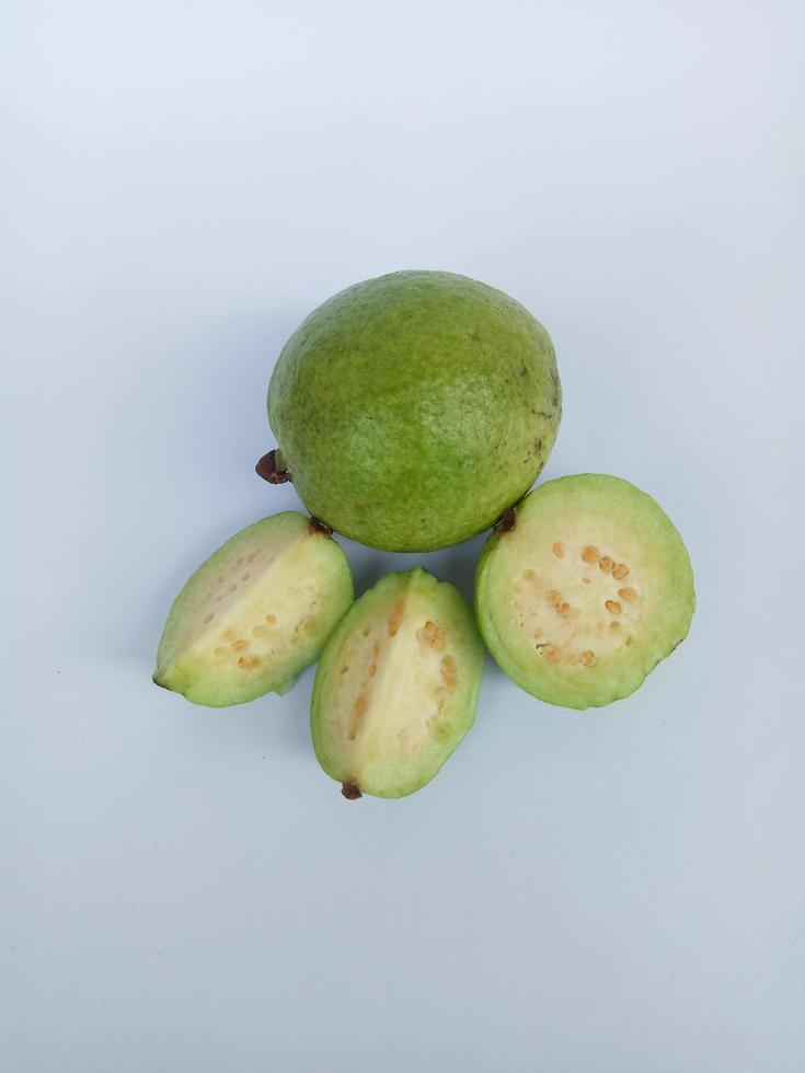 Some guavas isolated on white background photo