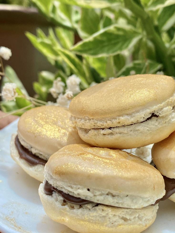 Closeup of gold macaroons photo