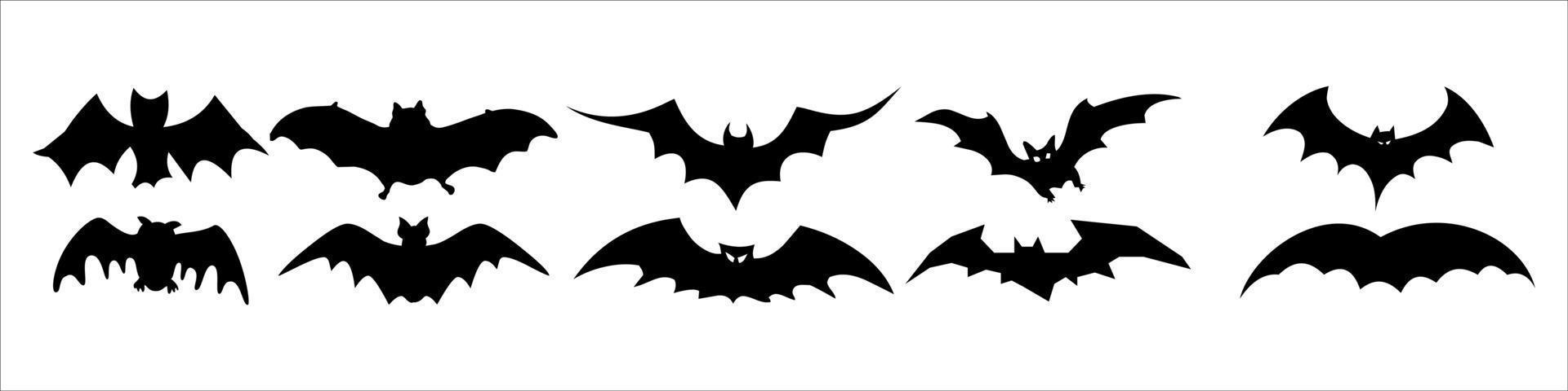 Siluetas negras de murciélagos sobre un fondo blanco. vector
