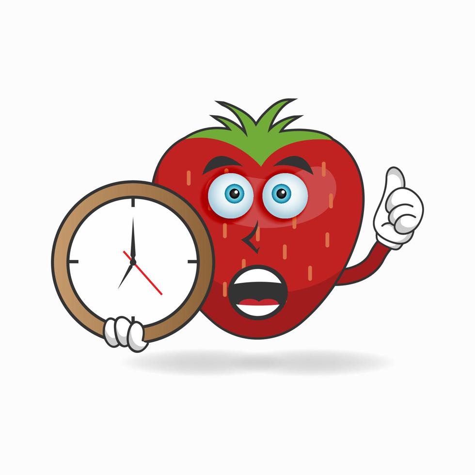 Personaje de mascota de fresa sosteniendo un reloj de pared. ilustración vectorial vector