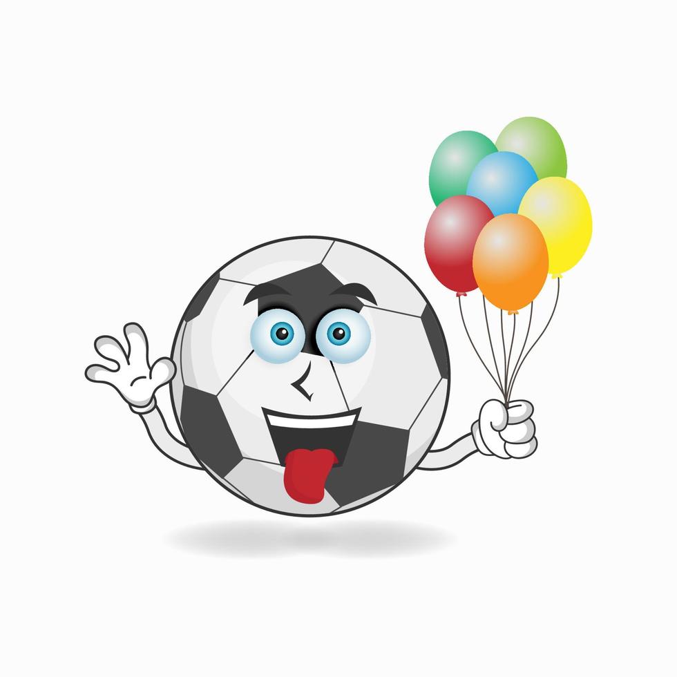 personaje de mascota de balón de fútbol sosteniendo un globo. ilustración vectorial vector