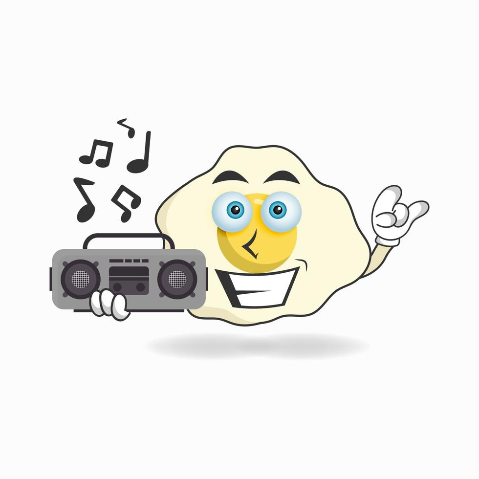 personaje de mascota de huevo sosteniendo una radio. ilustración vectorial vector