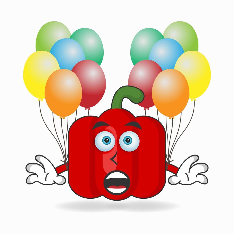 Personaje de mascota de pimentón rojo sosteniendo un globo. ilustración vectorial vector