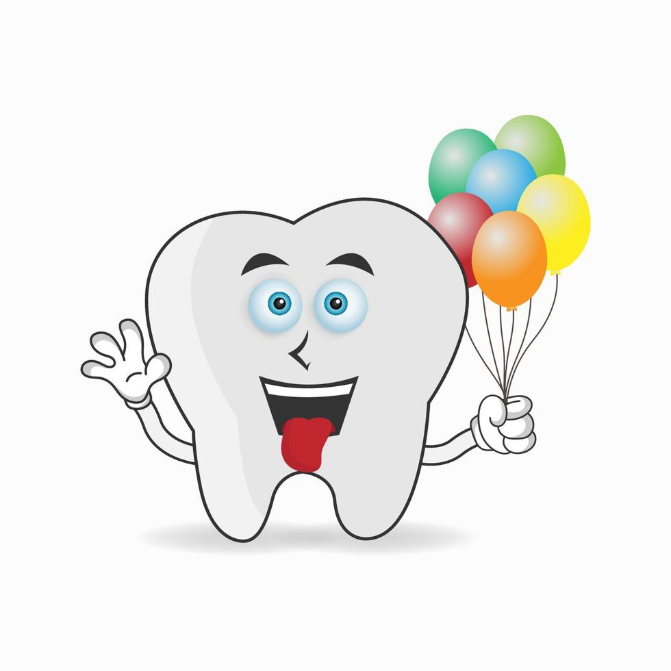Tooth mascot character holding a balloon. vector illustration