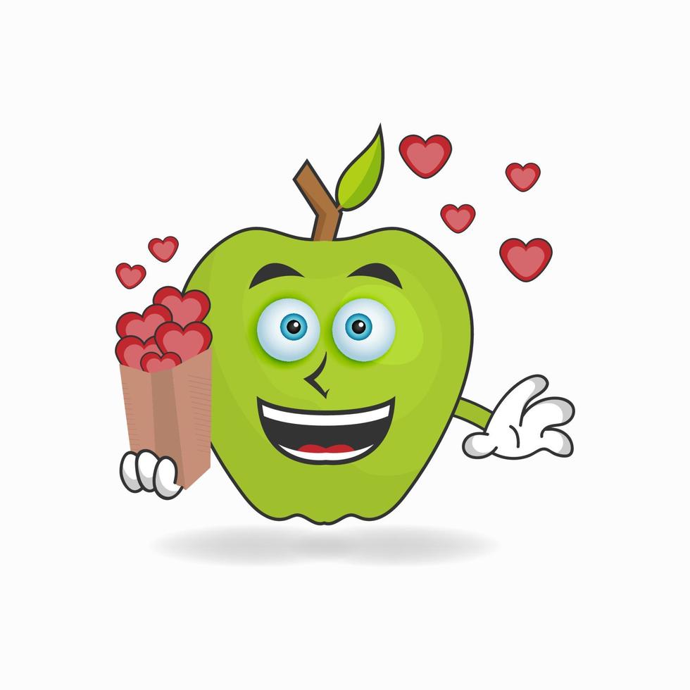 personaje de mascota de manzana sosteniendo un icono de amor. ilustración vectorial vector