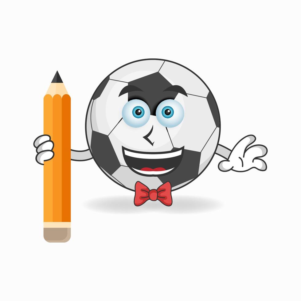 personaje de mascota de balón de fútbol sosteniendo un lápiz. ilustración vectorial vector