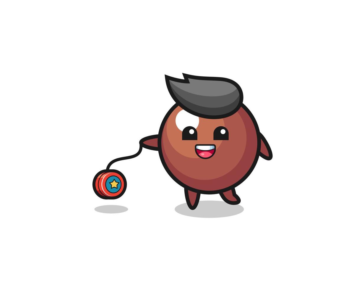 cartoon of cute chocolate ball playing a yoyo vector