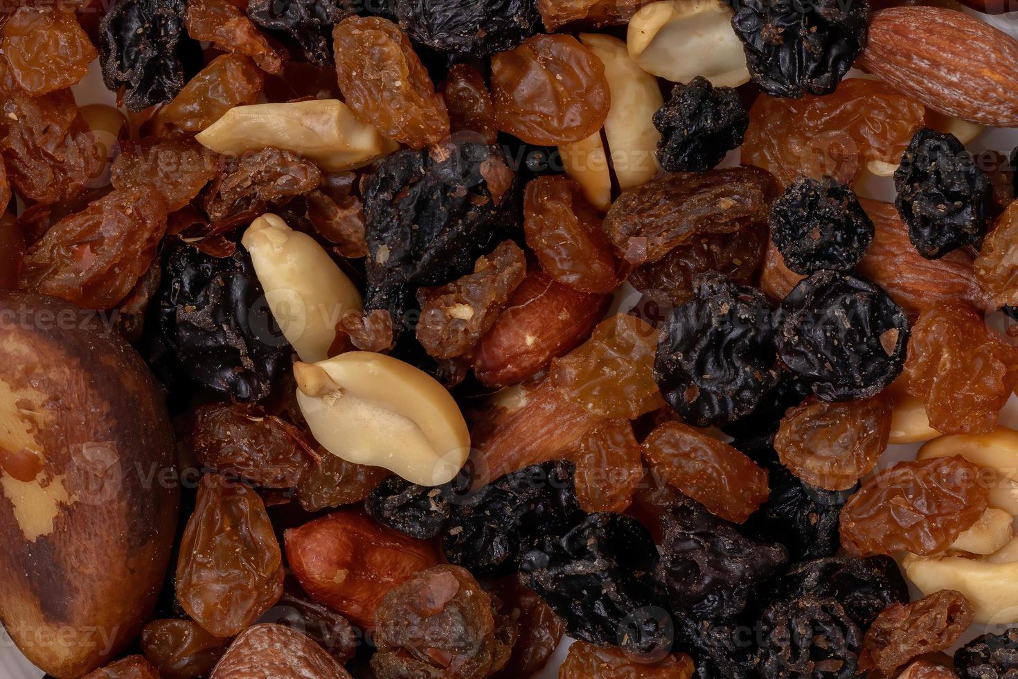 Mix of nuts with dried fruits photo
