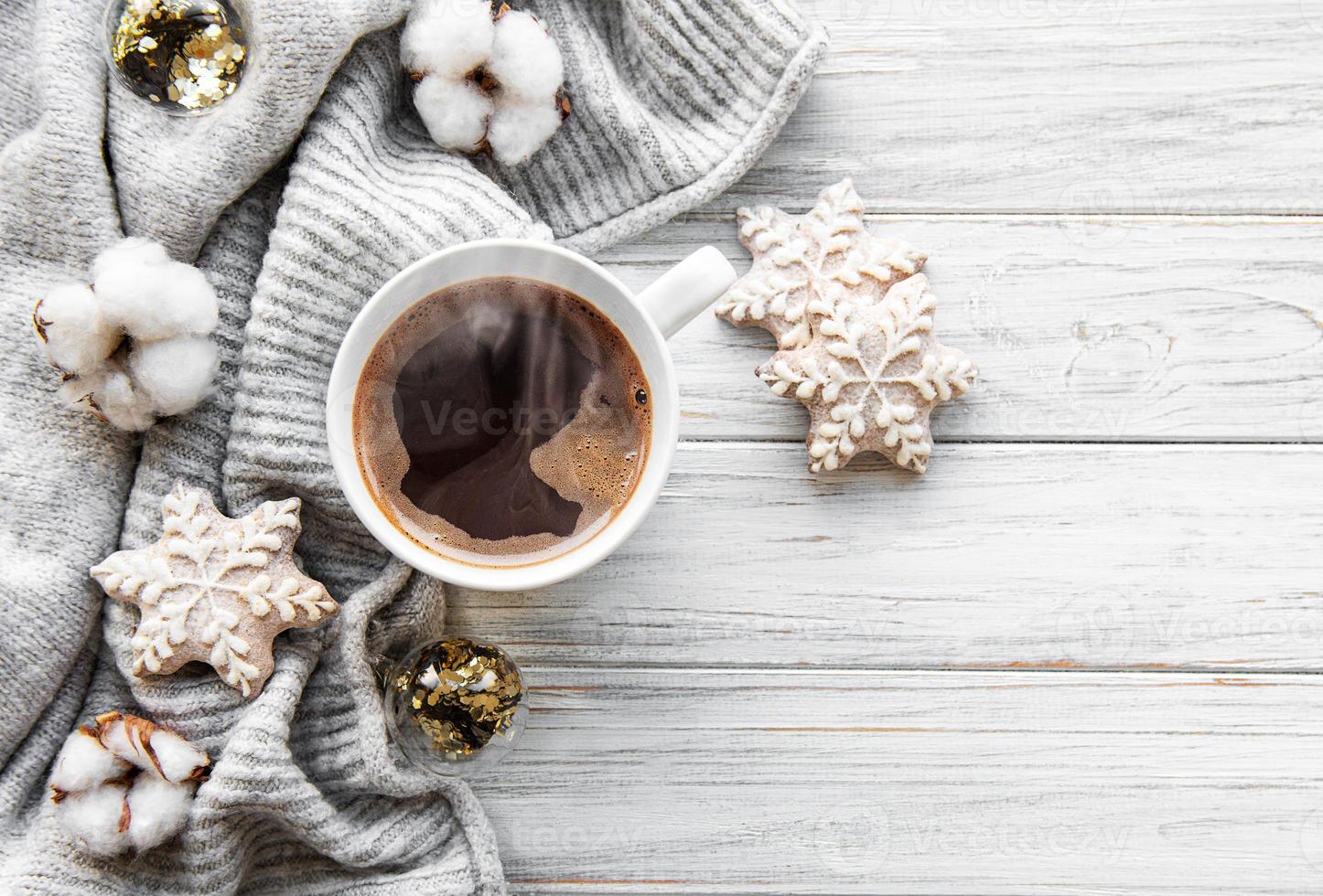 Christmas composition with cup of coffee and decorations photo