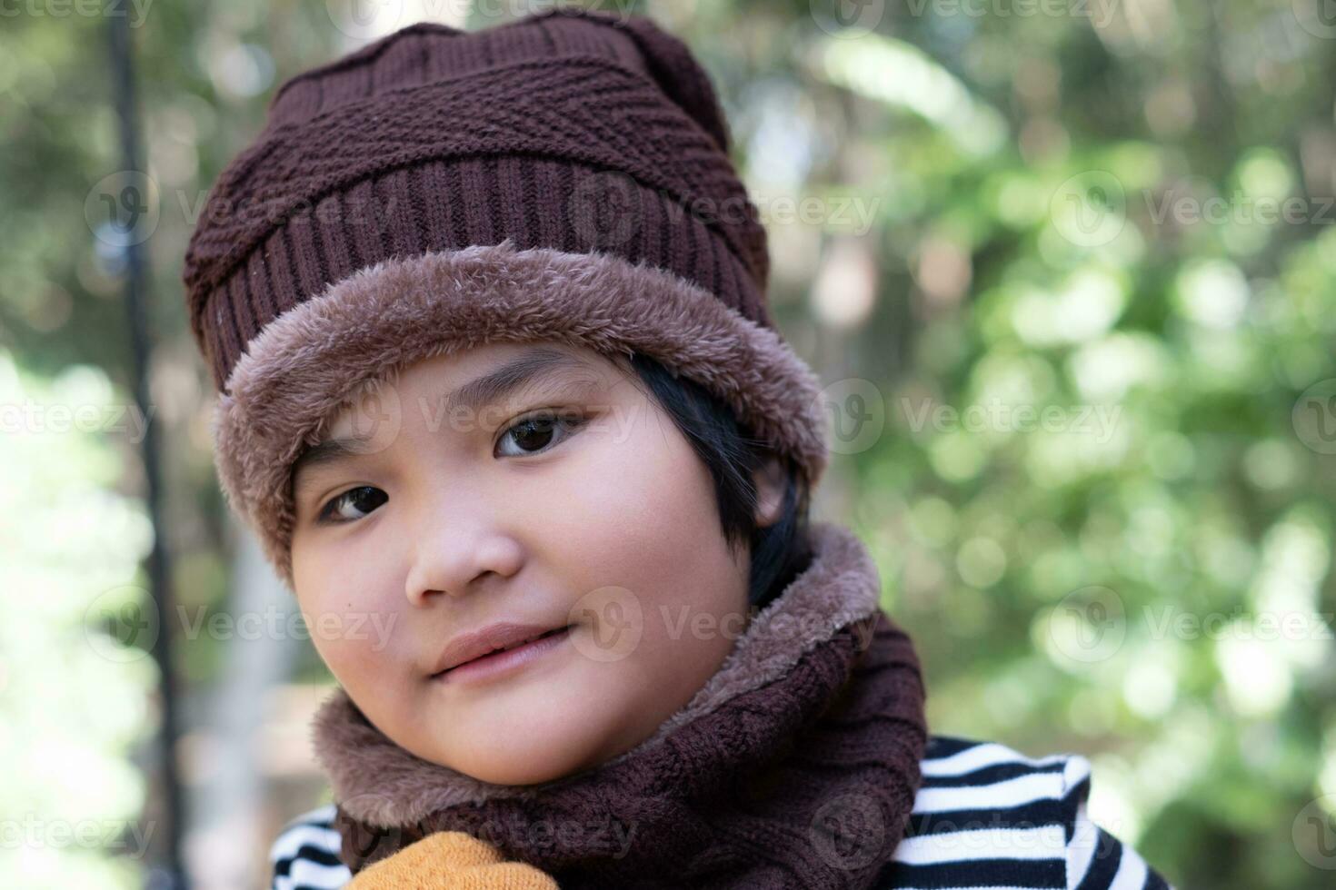 Portrait of a cute little girl in wool hat photo