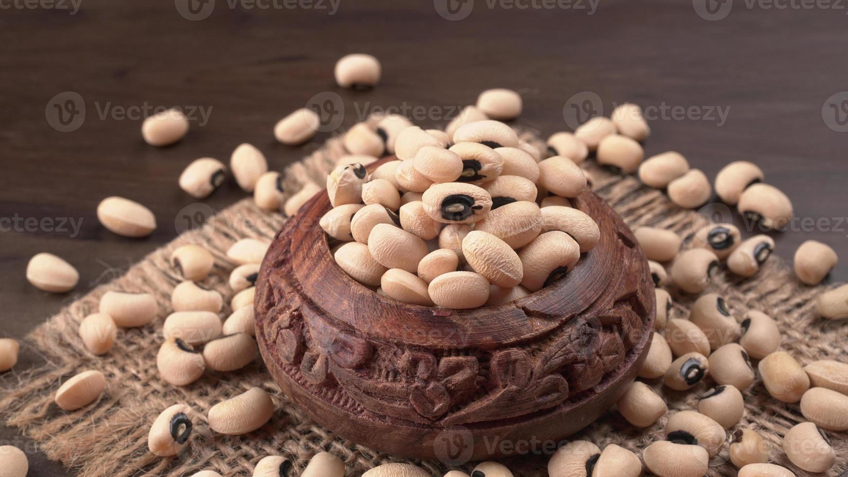 Uncooked black eyed peas. Health food concept. photo