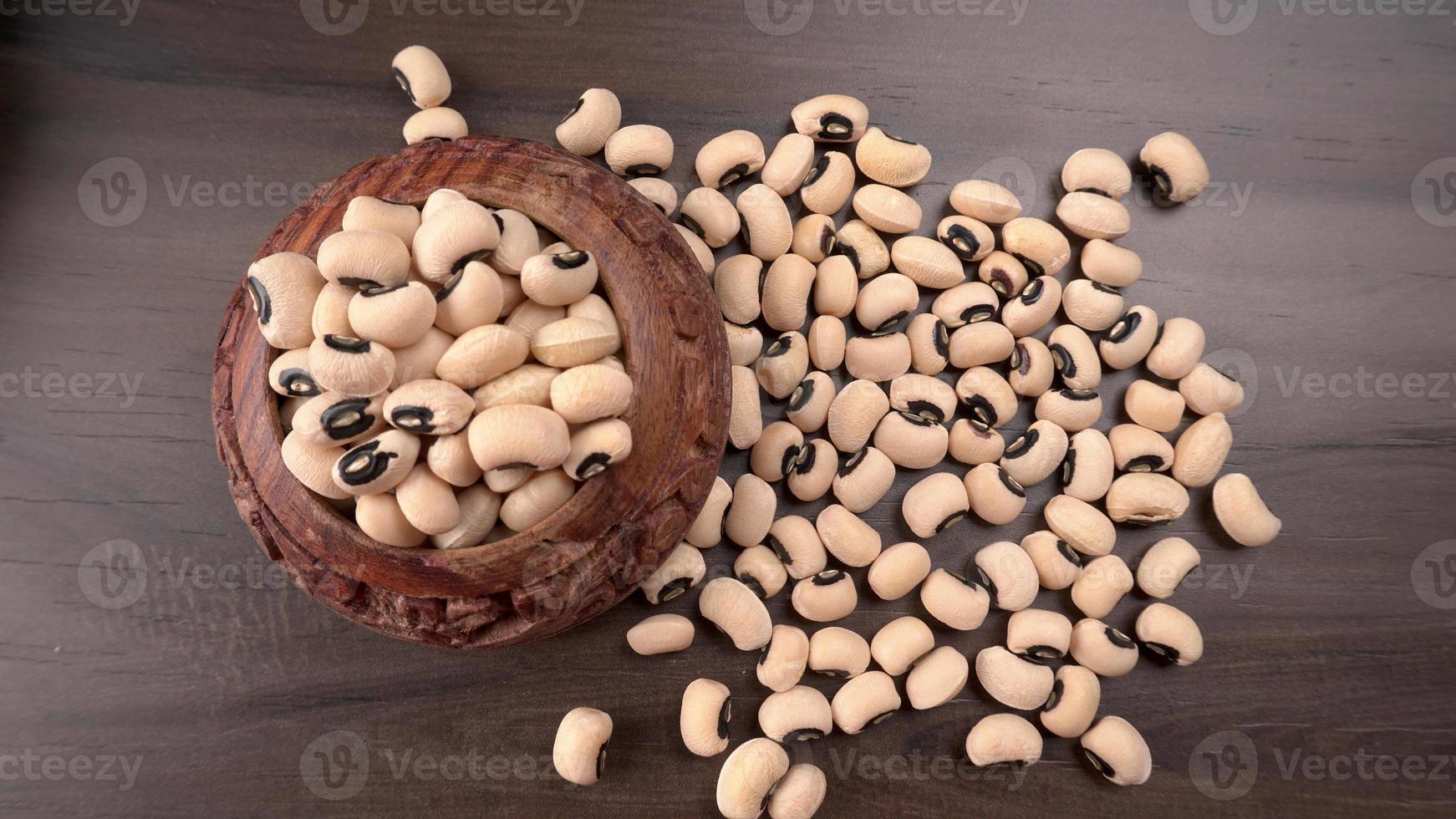 Uncooked black eyed peas. Health food concept. photo