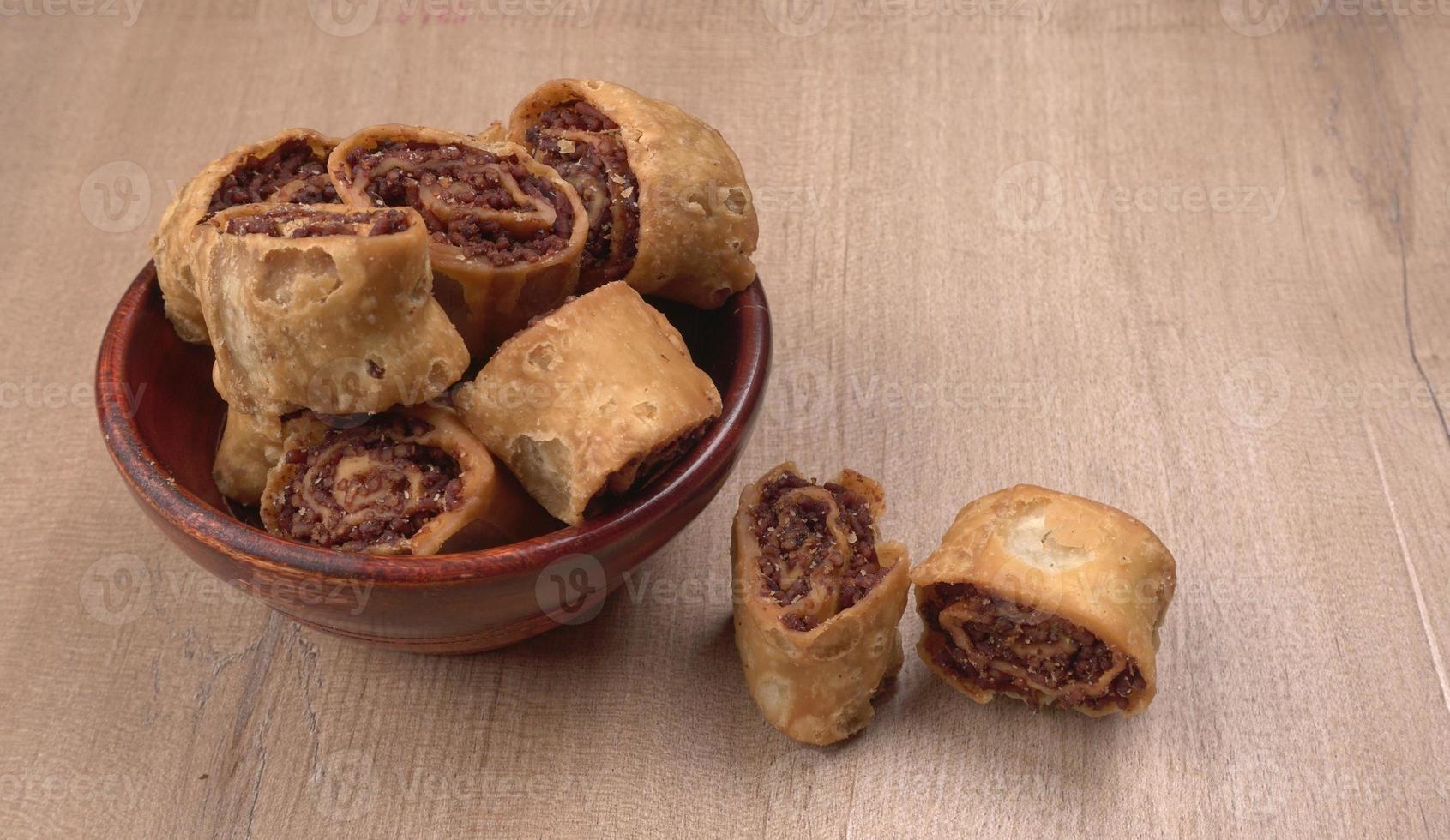 Indian traditional Snacks Bhakarvadi or Bakarvadi.Diwali snacks Bhakarwadi, selective focus photo