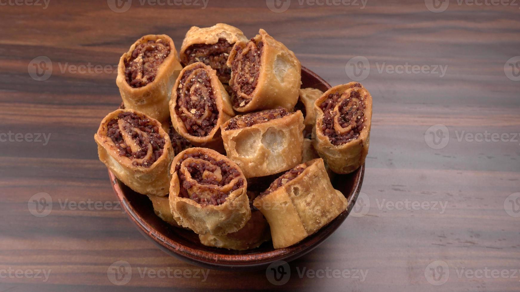 Indian traditional Snacks Bhakarvadi or Bakarvadi.Diwali snacks Bhakarwadi, selective focus photo
