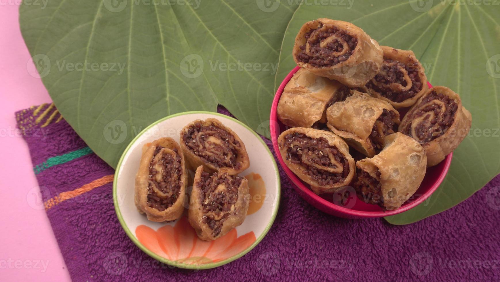Indian traditional Snacks Bhakarvadi or Bakarvadi.Diwali snacks Bhakarwadi, selective focus photo