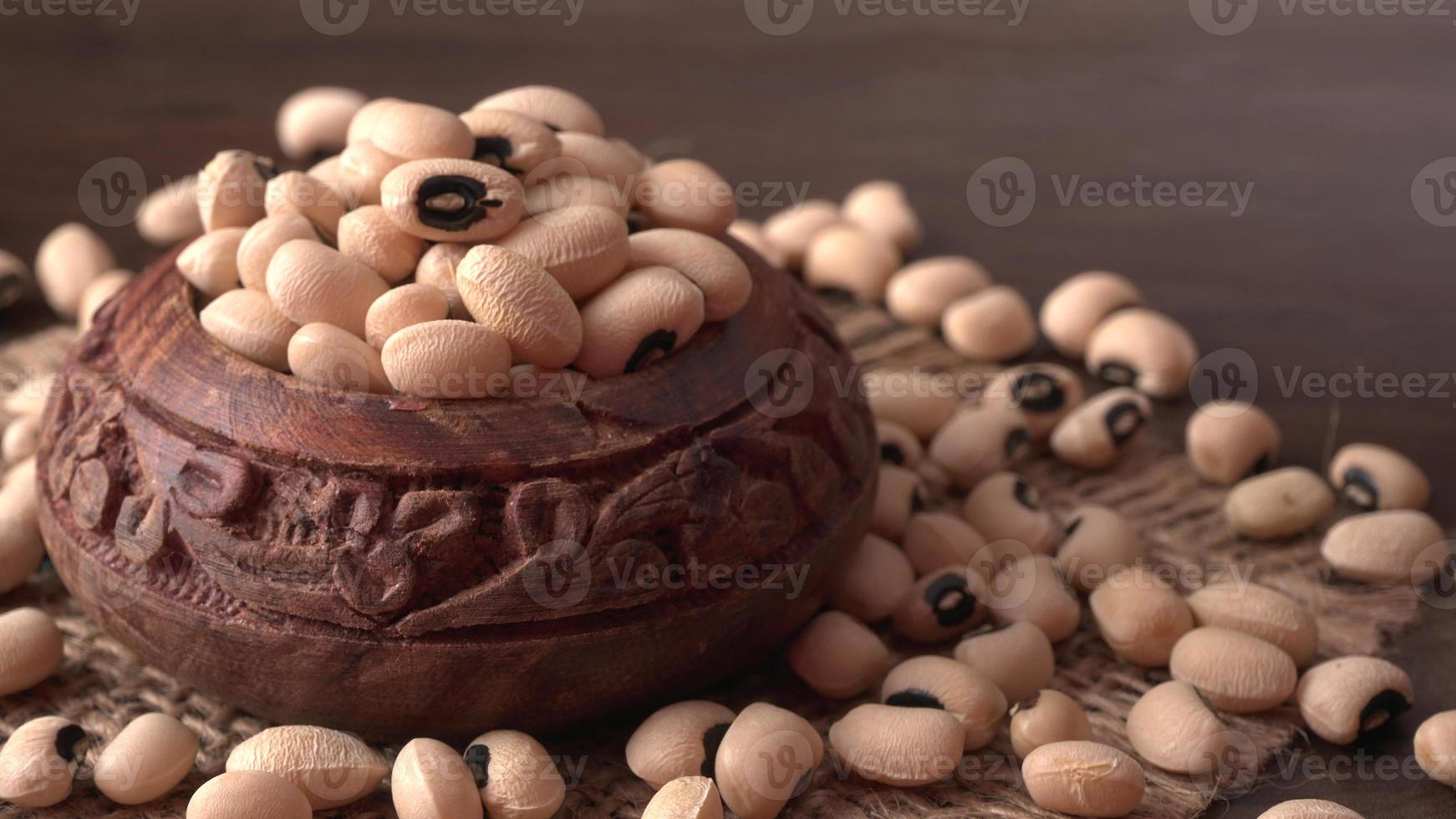 Uncooked black eyed peas. Health food concept. photo