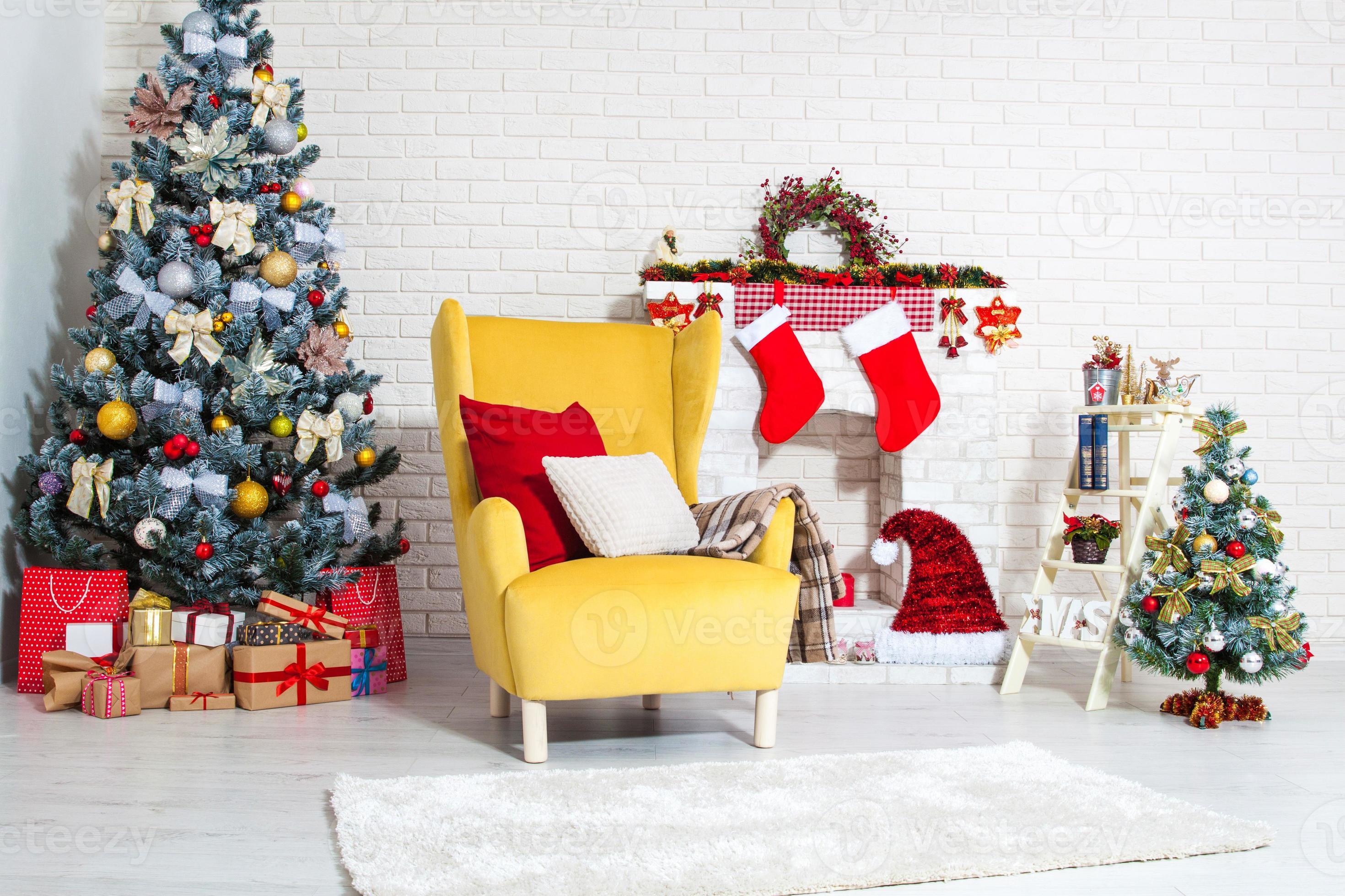 Christmas decor of bright stylish living room with yellow armchair ...