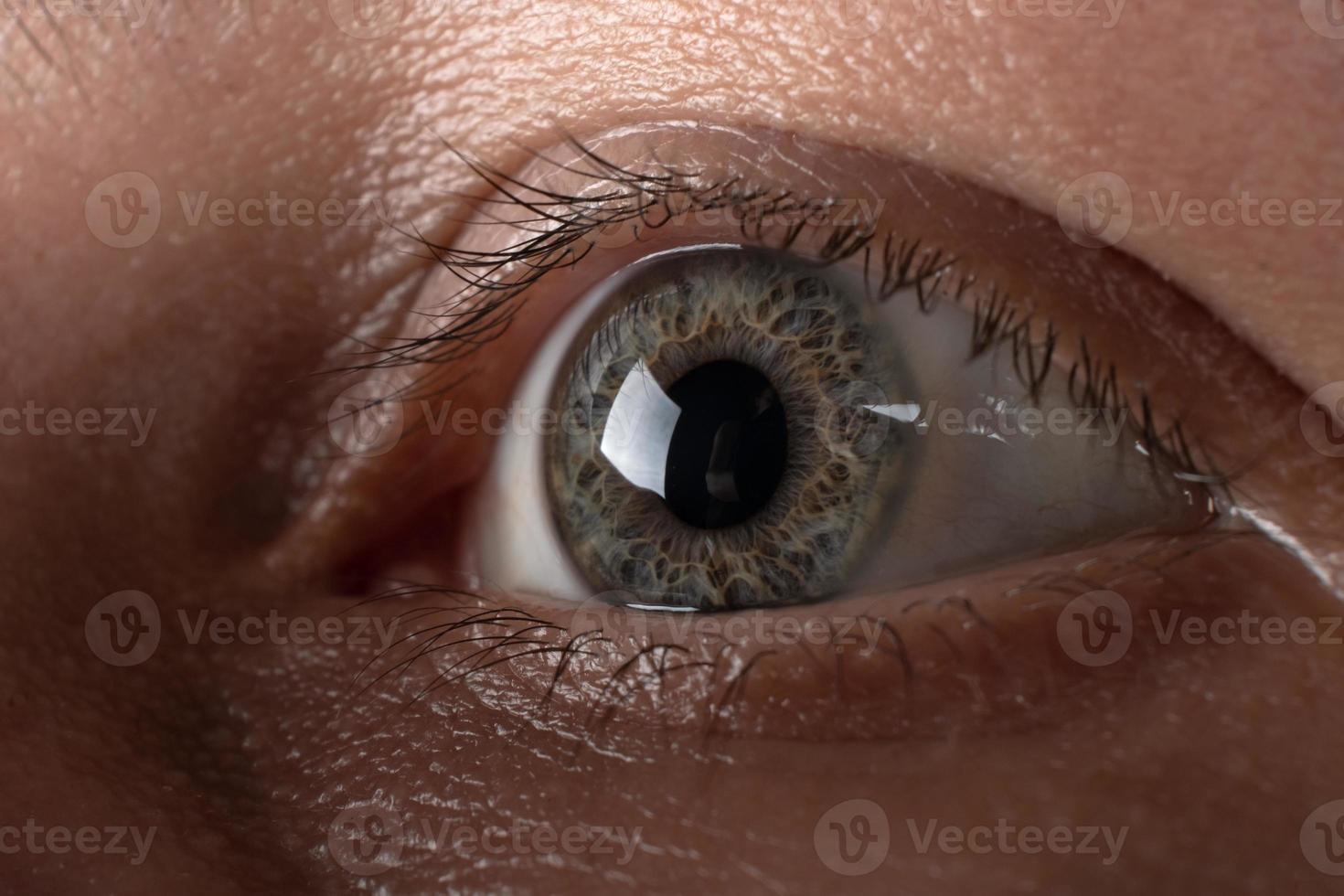 human eye sight in a dark room close-up photo