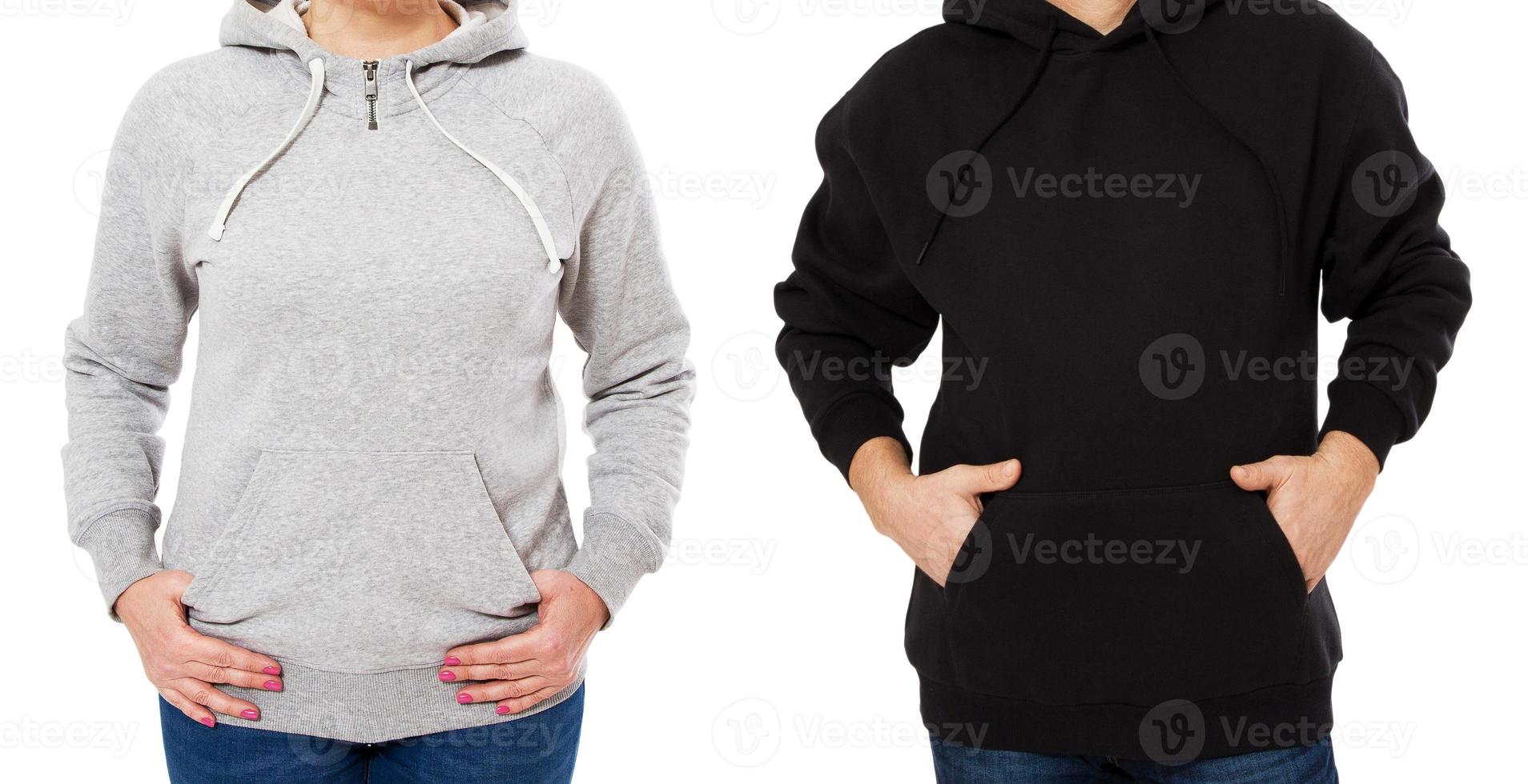 Close up young couple wearing hoodie. man has black hoodie. girl has grey hoodie isolated over white background photo