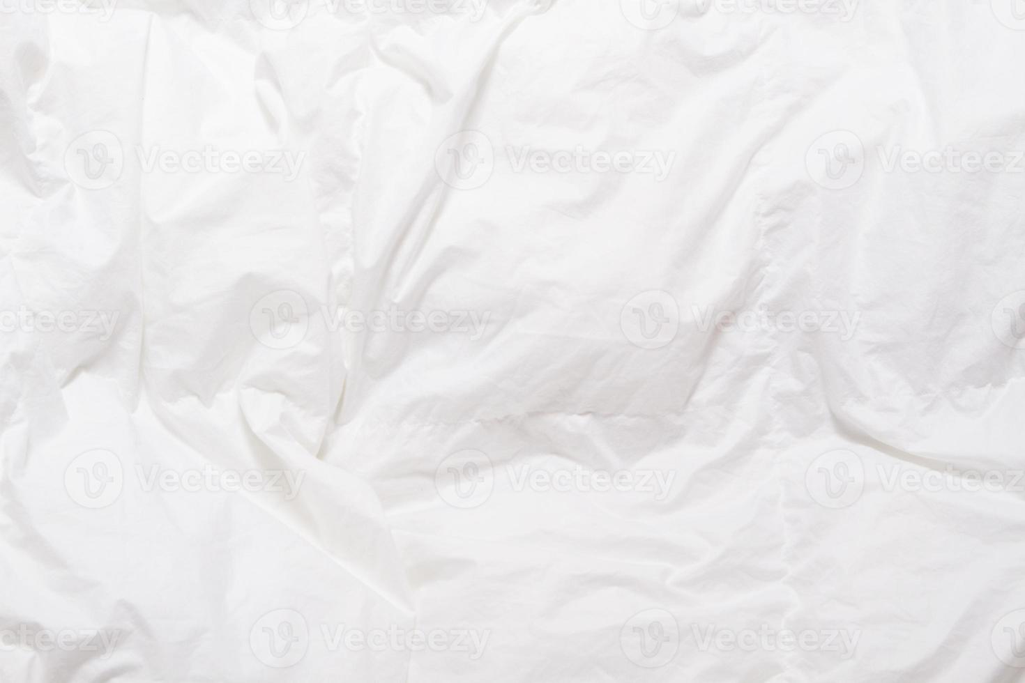 Top view of bedding sheets crease, white blanket texture. Close up of bedding sheets with copy-space photo