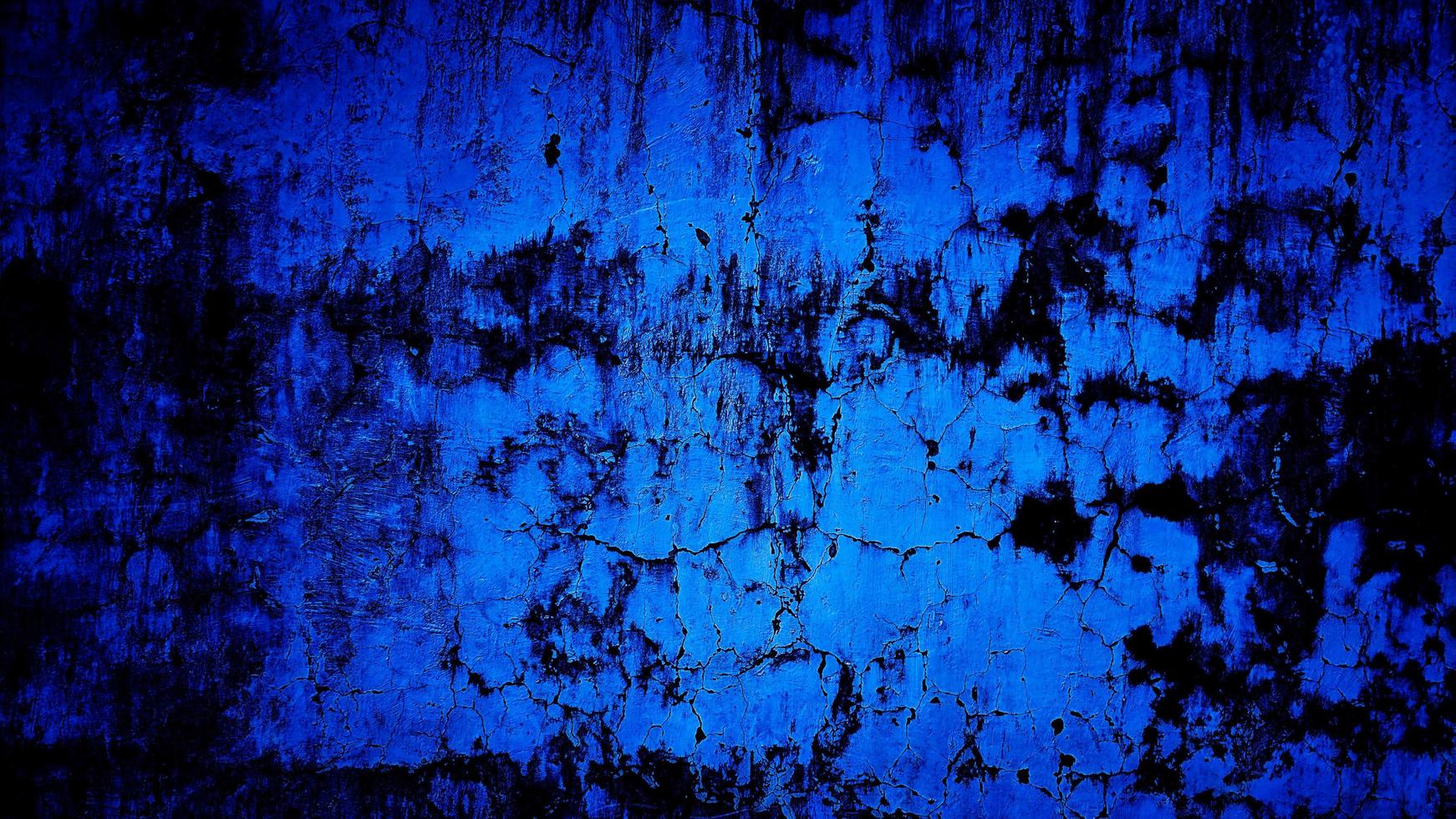 Fondo de hormigón de pared azul de textura grunge oscuro foto