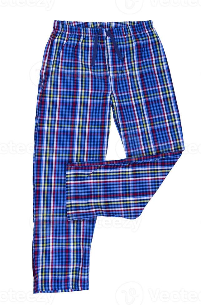 Pajamas pants isolated on white background. Plaid sleep pants close up photo