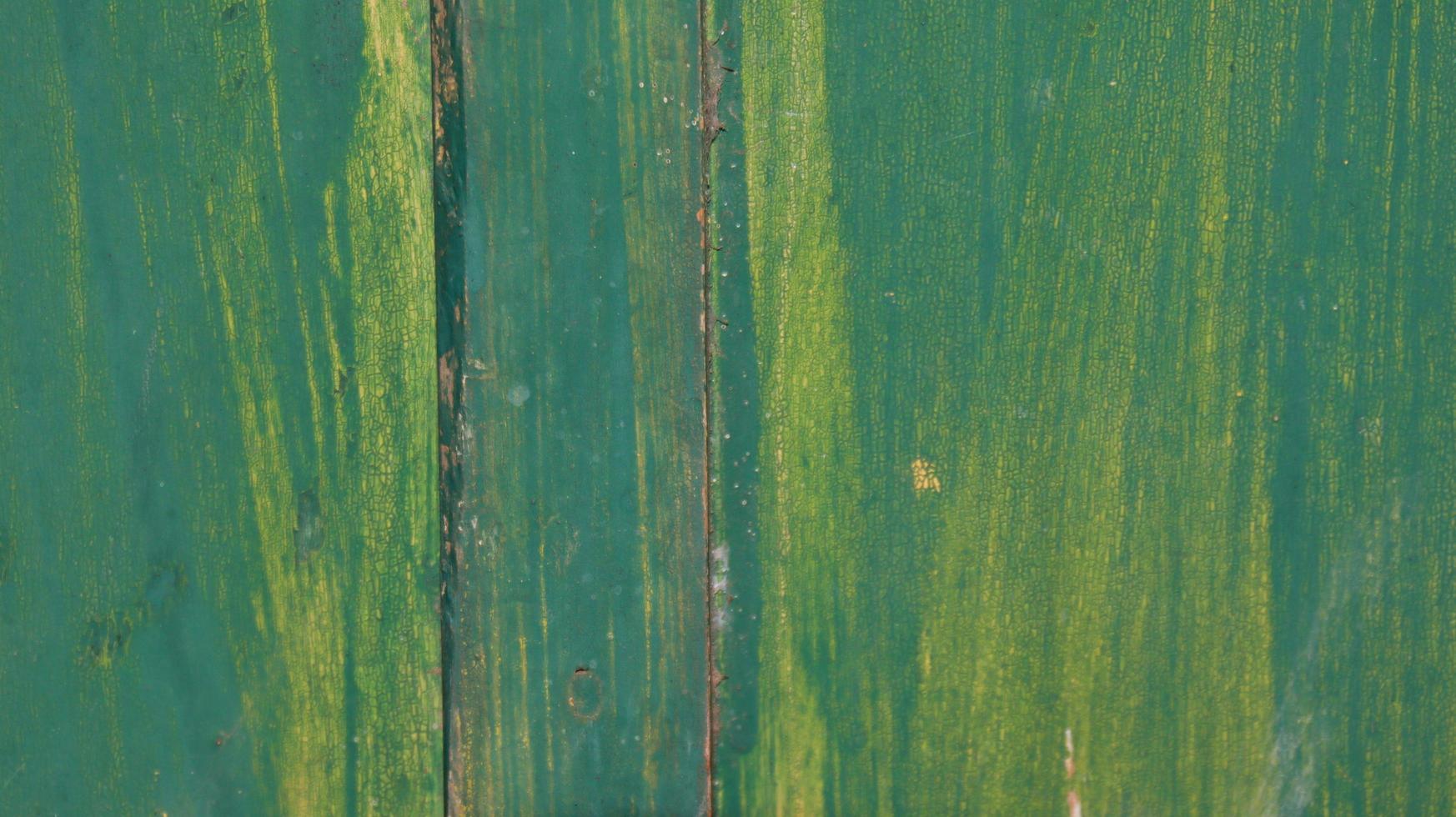 Wooden wall with weathered and porous photo