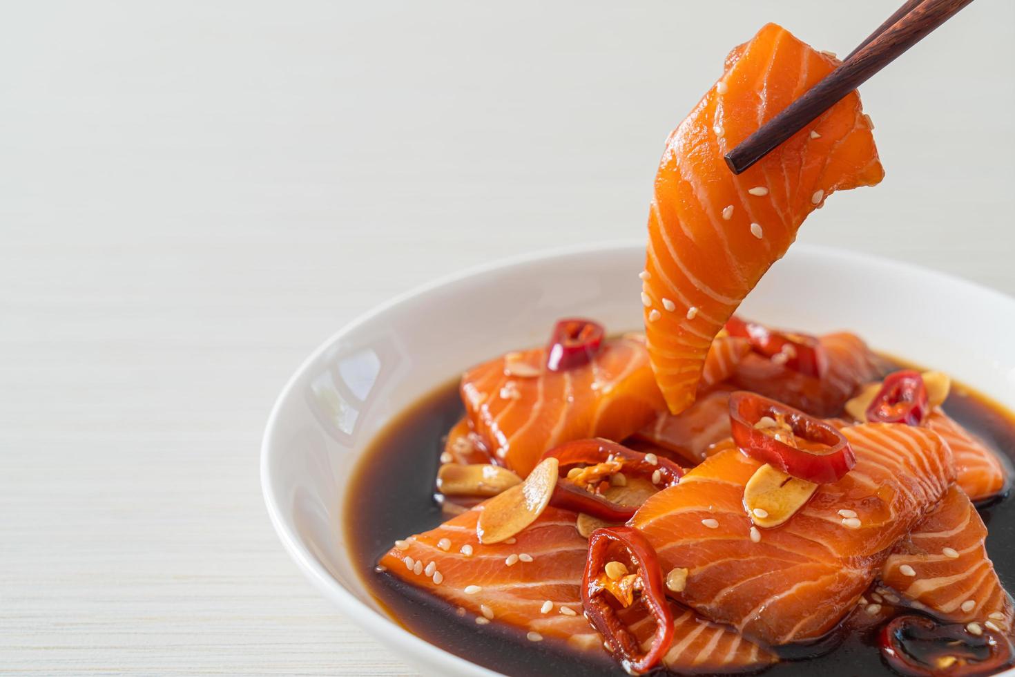 fresh salmon raw pickled in shoyu sauce photo