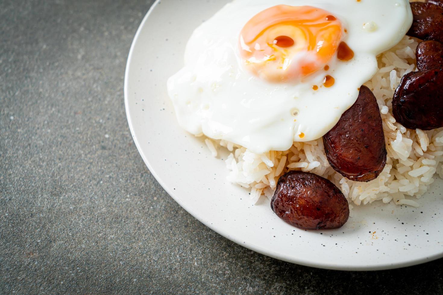 rice with fried egg and Chinese sausage photo