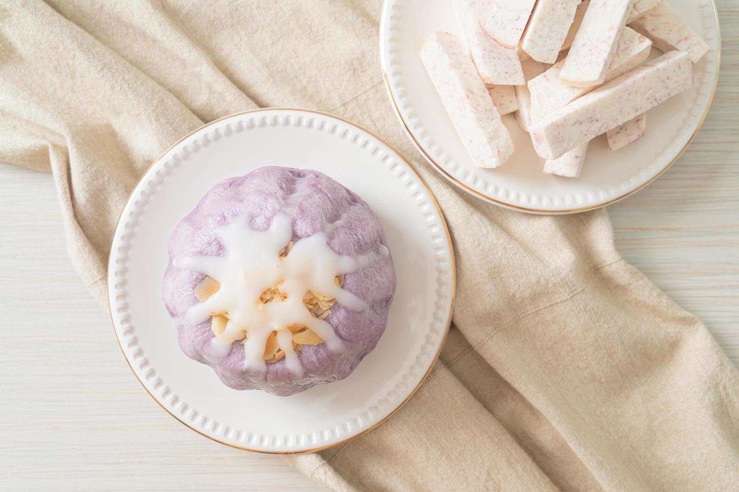 taro bun with white sugar cream and nut photo