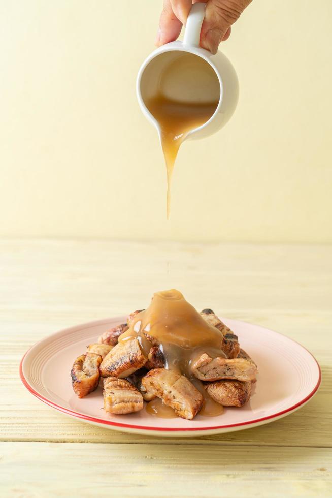 grilled bananas with coconut caramel sauce photo