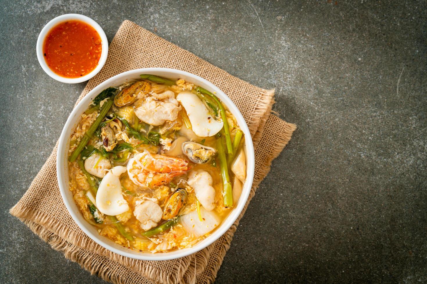 Sukiyaki soup with seafood bowl photo