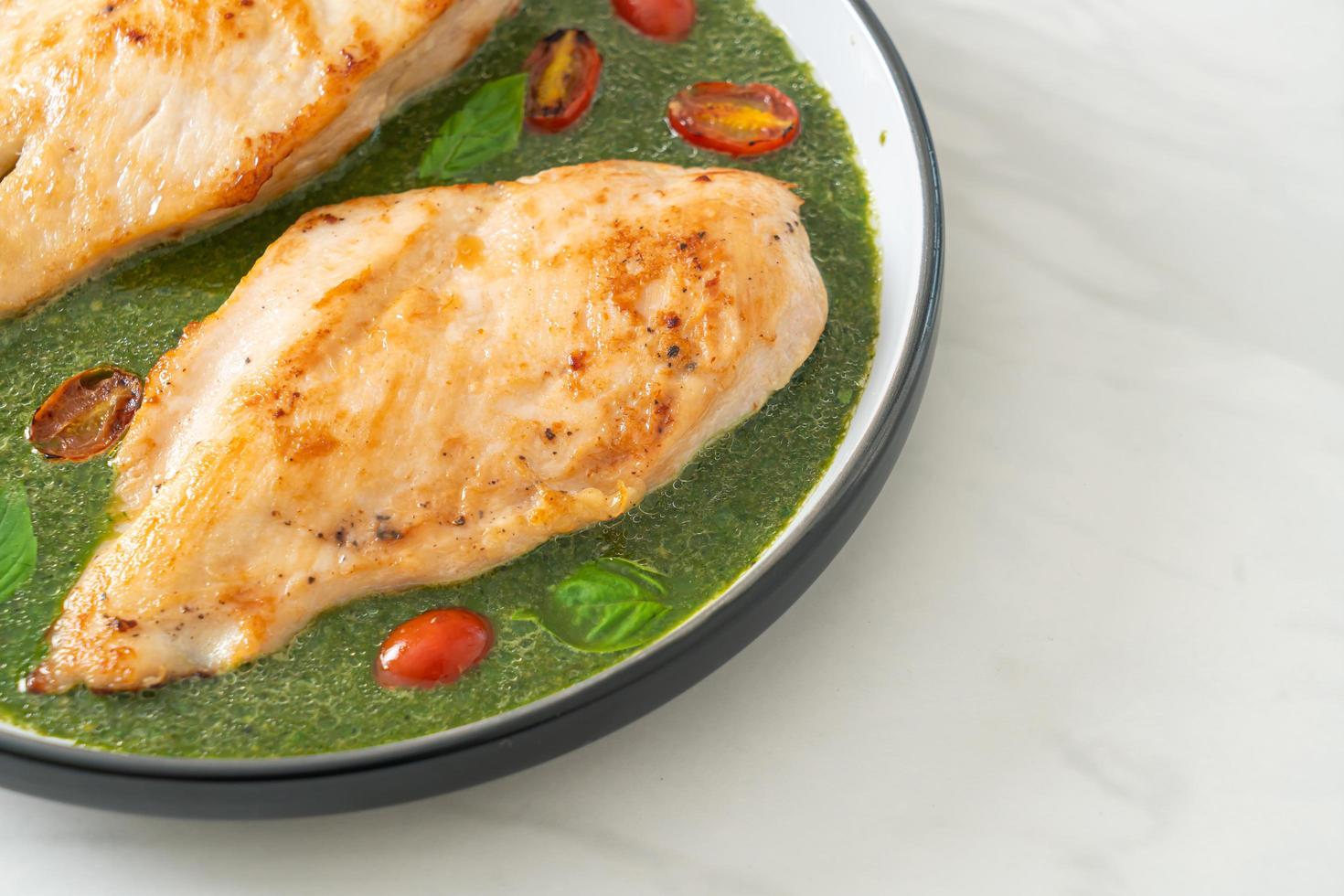 grilled chicken steak with pesto sauce photo