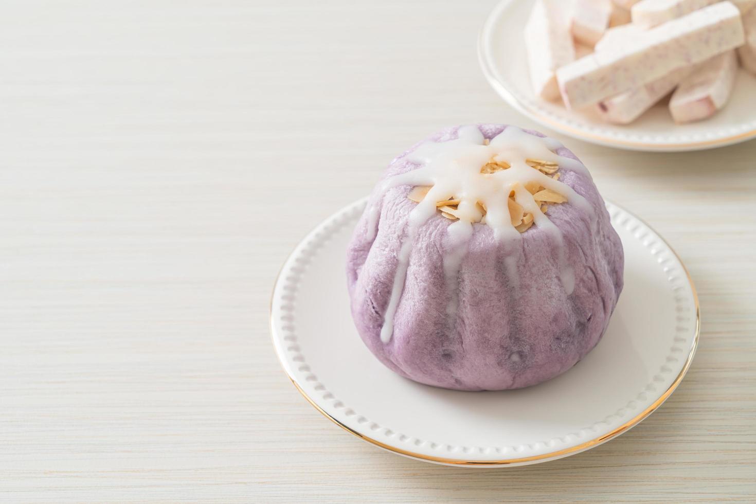 taro bun with white sugar cream and nut photo