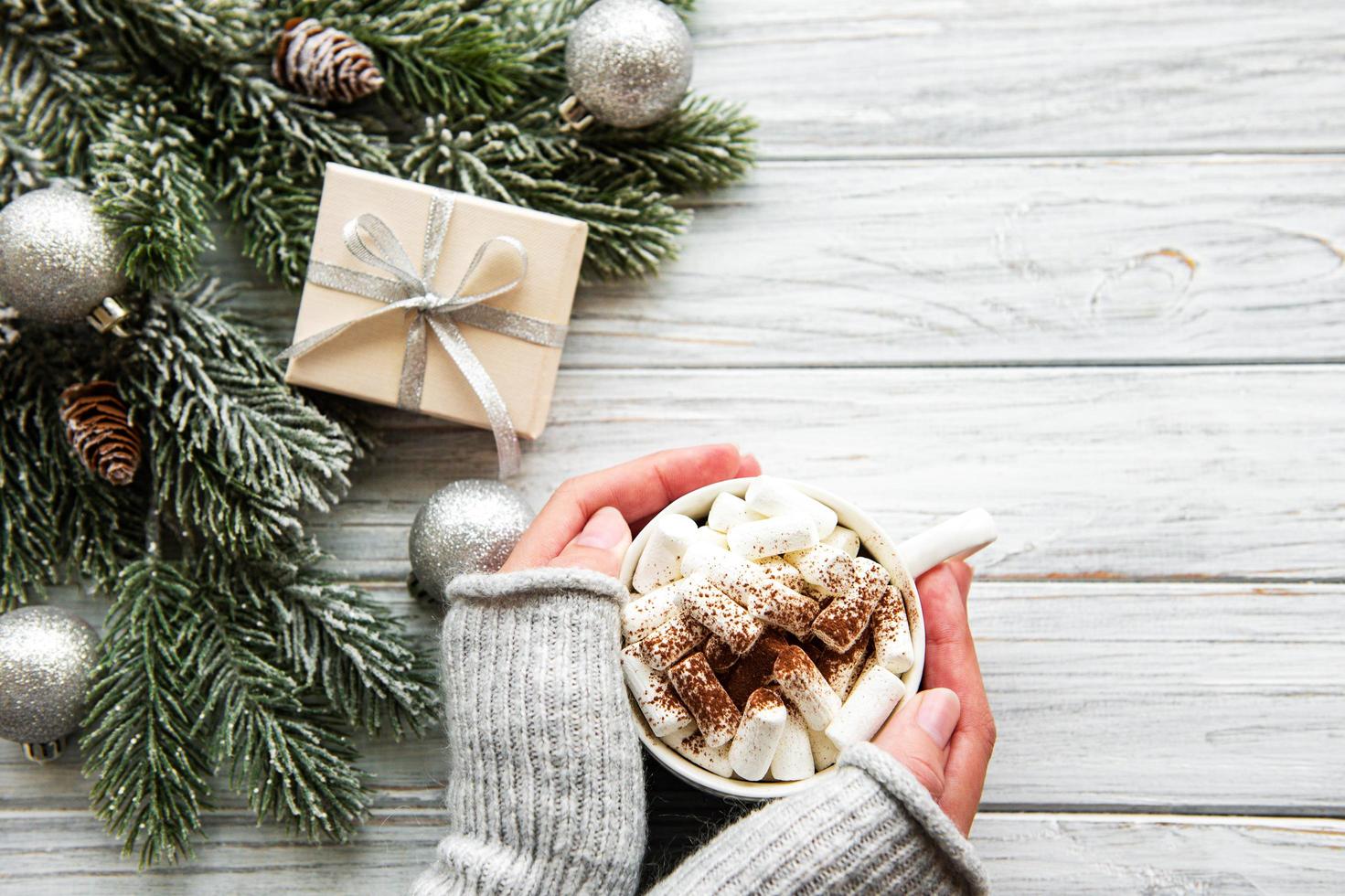 Hot cocoa and Christmas decorations photo