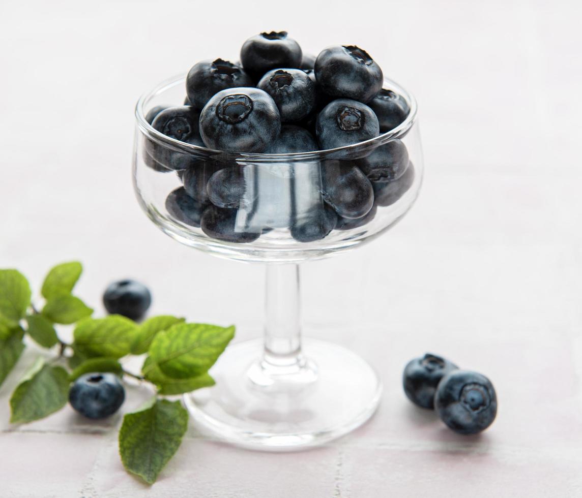 Blueberries on tile background photo