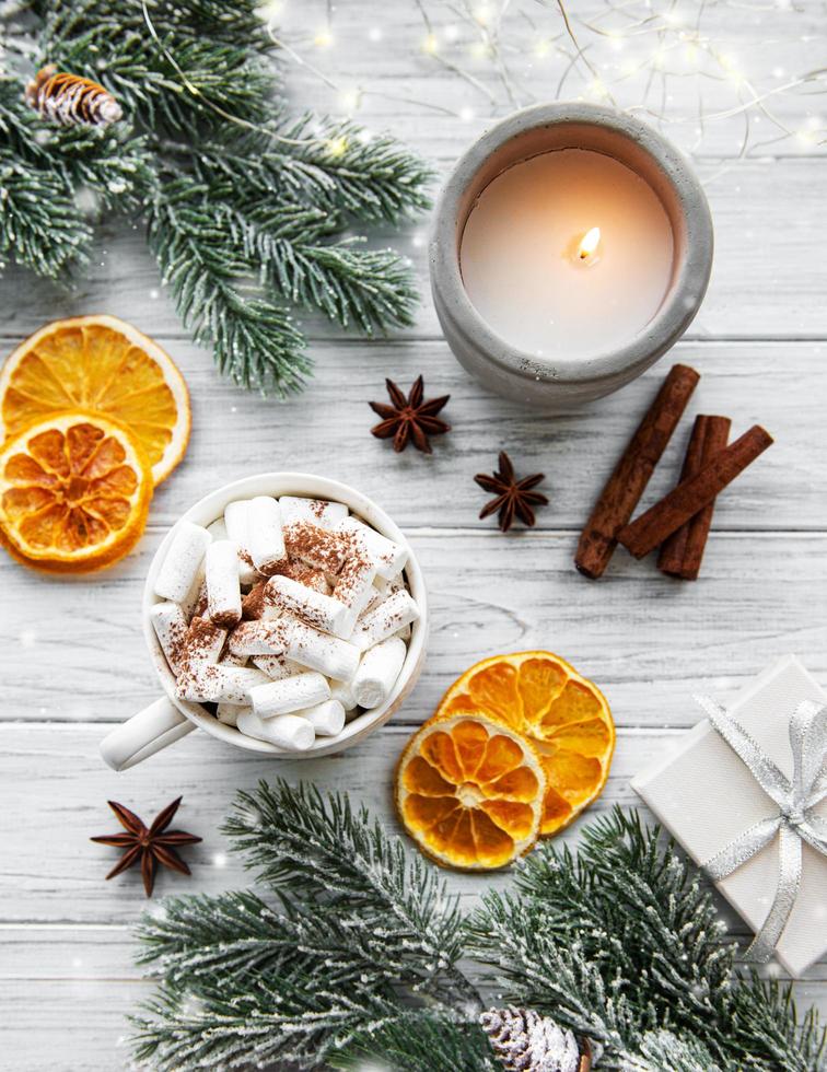 Christmas composition with hot chocolate and decorations photo