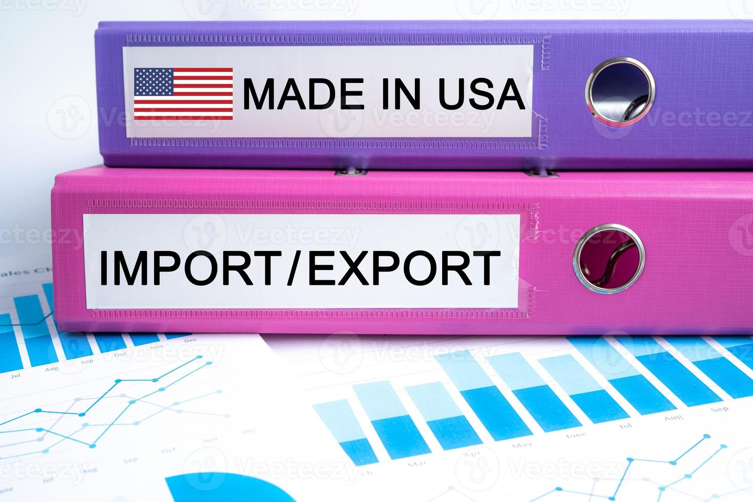 Made in USA, Import and Export. Binder data finance report business with graph analysis in office. photo