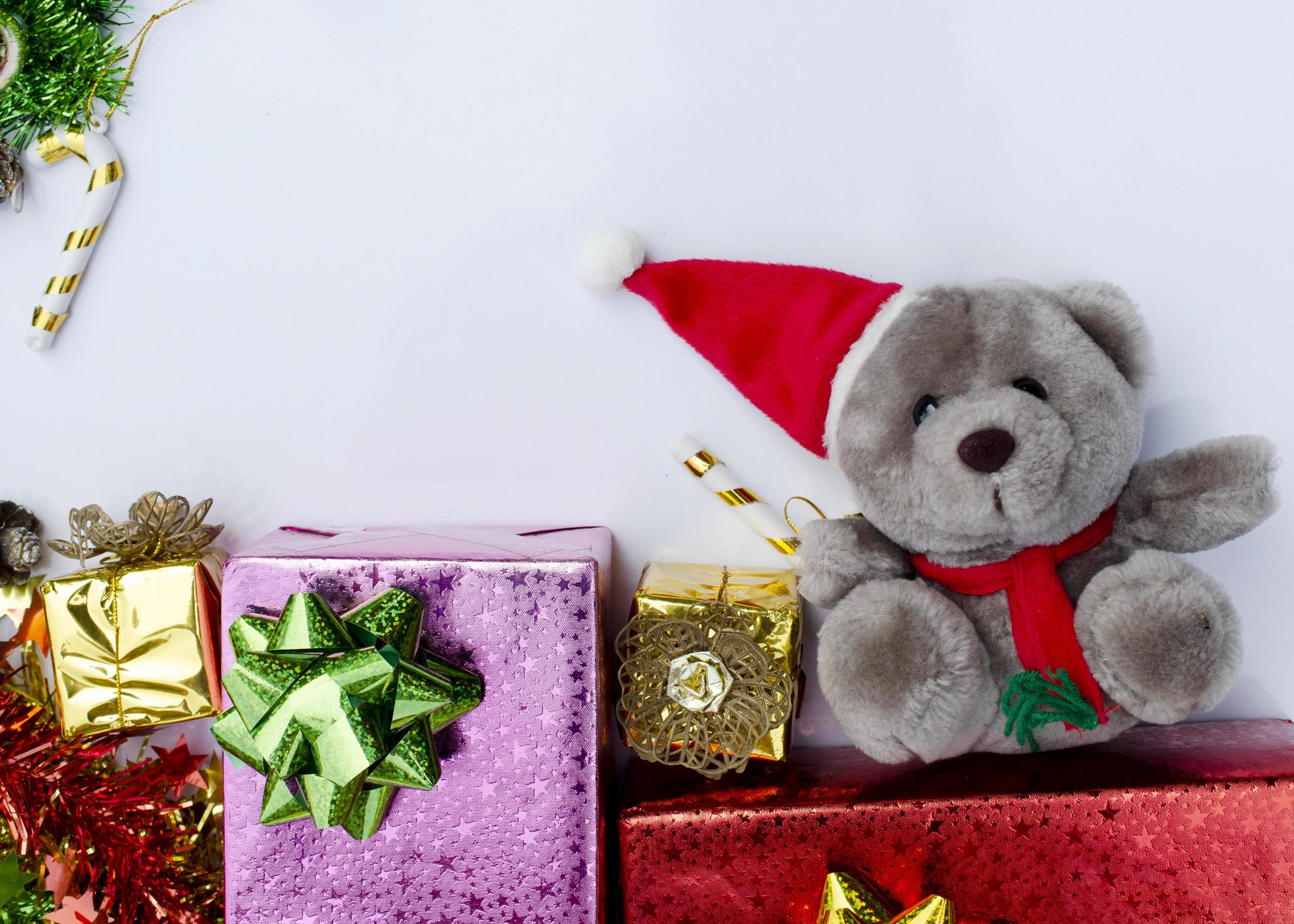 Christmas backgrounds with teddy and gift box on white backgrounds 3817292  Stock Photo at Vecteezy